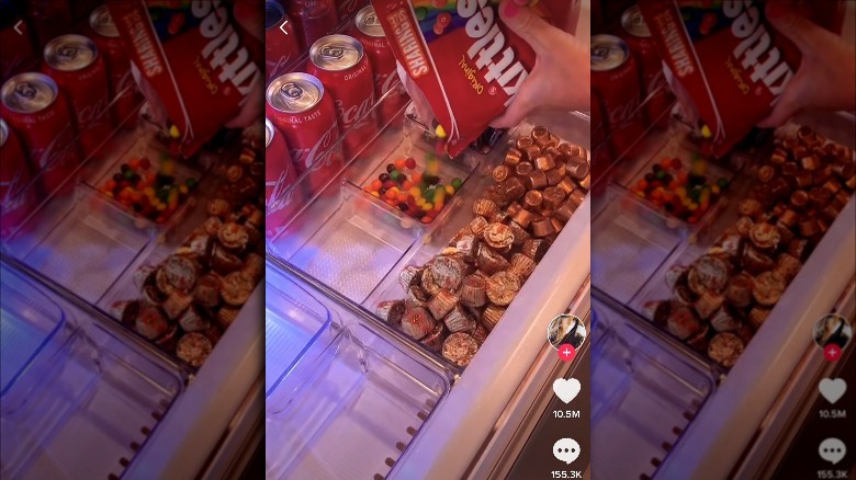 Pouring Skittles into refrigerator drawer