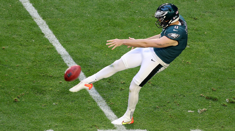  Arryn Siposs punts the ball during Super Bowl