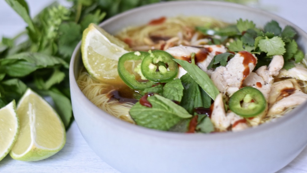 finished pho in white bowl