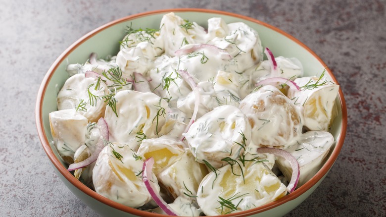 potato salad with dill on top