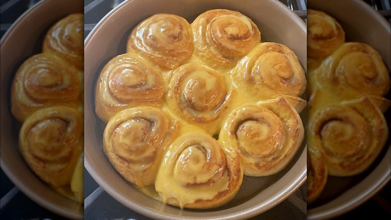 pan of orange cinnamon rolls