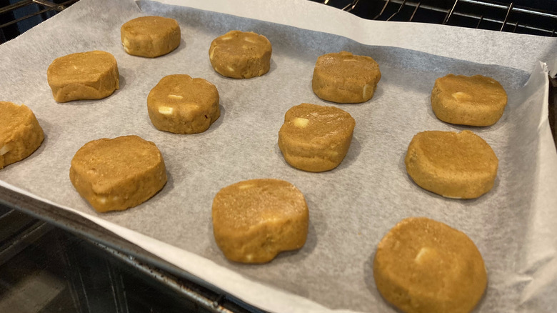 baking sheet going into oven