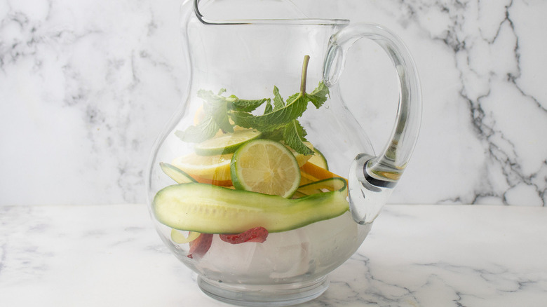 pitcher with ice and fruit