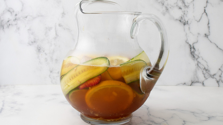 pitcher with ice fruit liquid