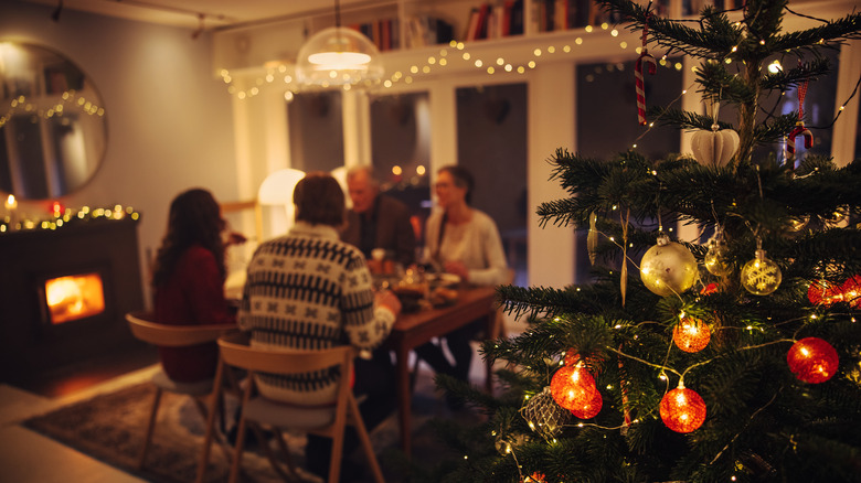 A holiday dinner complete with a tree