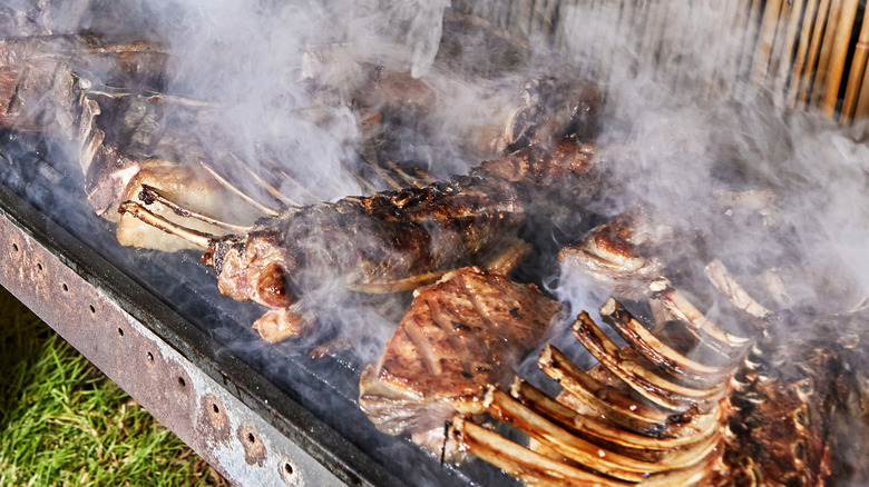 meat charred and smoking