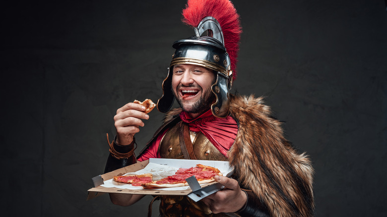 roman soldier with pizza