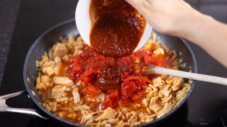 chipotle sauce going into pan 