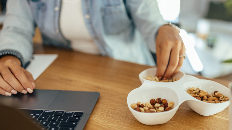 snacking on nuts