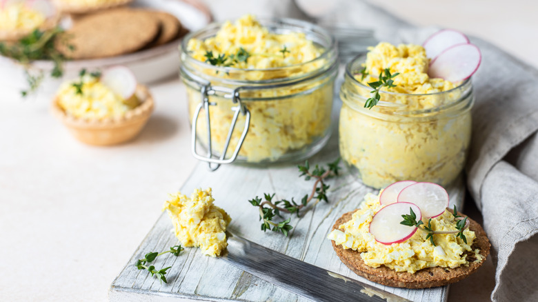 egg salad in jars and on a cracker