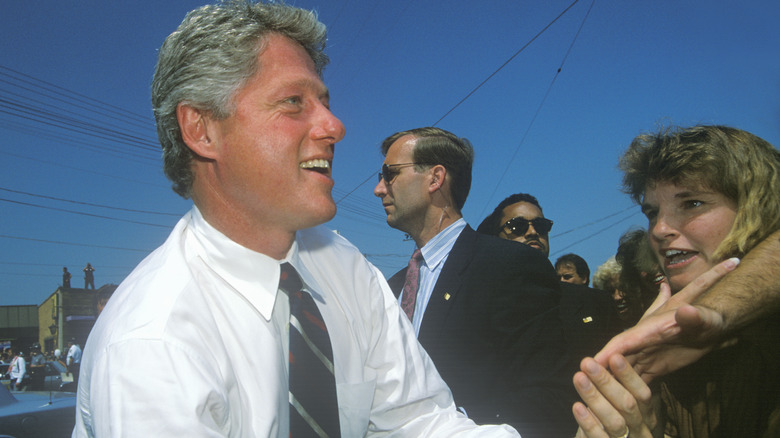 Bill Clinton greeting supporters