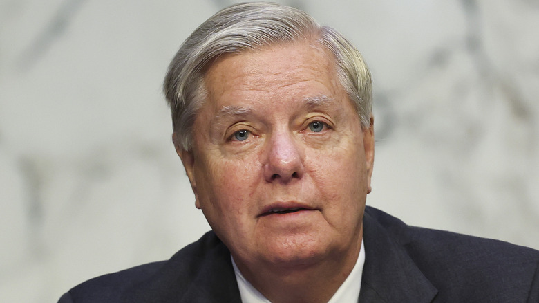 Lindsey Graham listens during hearing