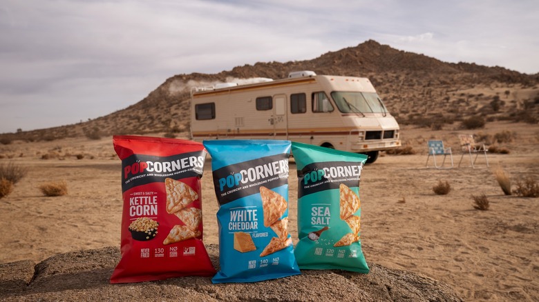 Three bags of PopCorners chips in desert