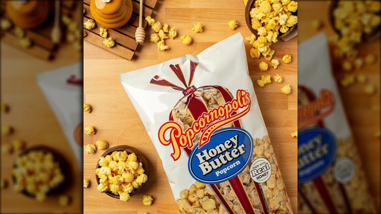 Bag and bowls of Popcornopolis popcorn