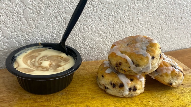 cheesecake next to biscuit stack