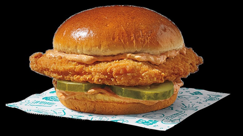 Popeyes spicy flounder sandwich with sides