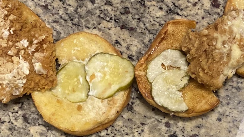 KFC and Popeye's sandwich toppings shown