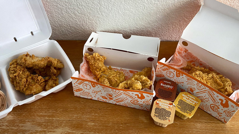 boxed cane's and popeyes tenders