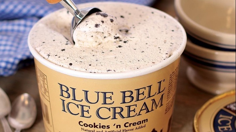 Open Container of Blue Bell Cookies 'n Cream Ice Cream Being Scooped