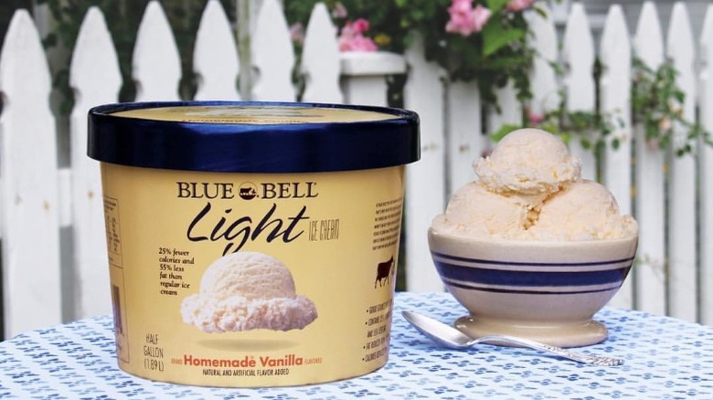Blue Bell Light Homemade Vanilla Ice Cream Container and Bowl on Table