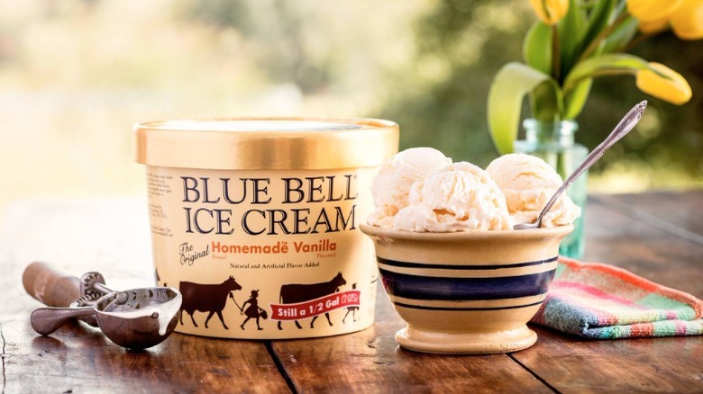 Bowl and Container of Blue Bell Homemade Vanilla Ice Cream on Table