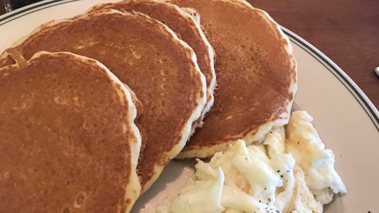 pancakes and eggs on plate