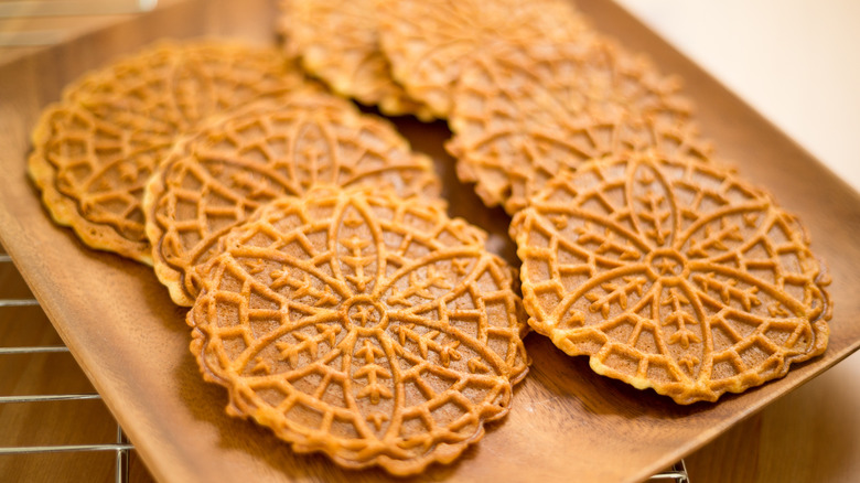 Pizzelle on wooden tray