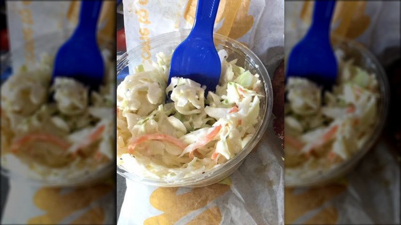 Bowl of Culver's Coleslaw with blue plastic fork