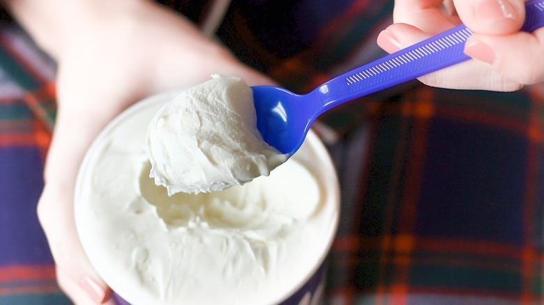 Woman eating custard