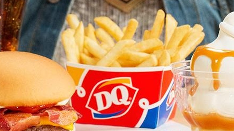 Fries in container with burger and butterscotch sundae at Dairy Queen
