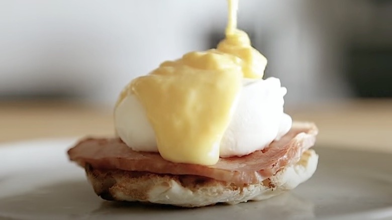 Hollandaise sauce on a homemade Egg McMuffin