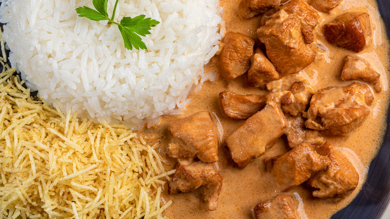 Beef Stroganoff with rice and fries