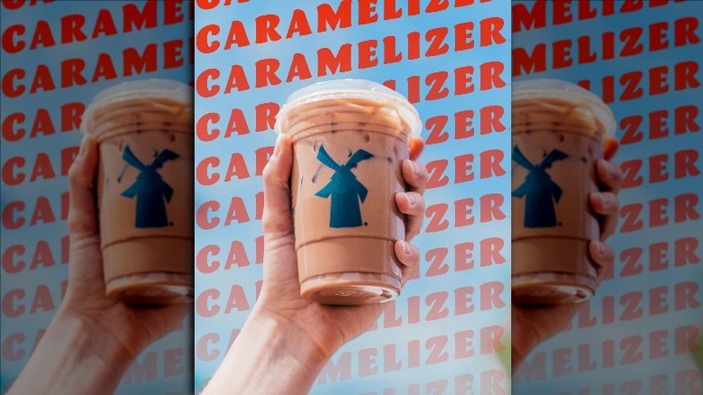 Caramelizer drink in a hand