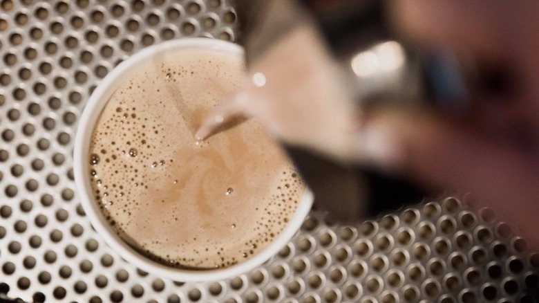 Dutch Cocoa pouring into cup