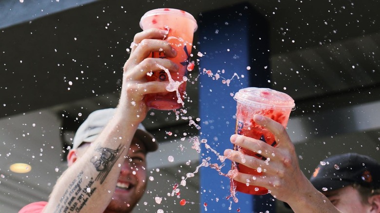 people celebrating with lemonade drinks