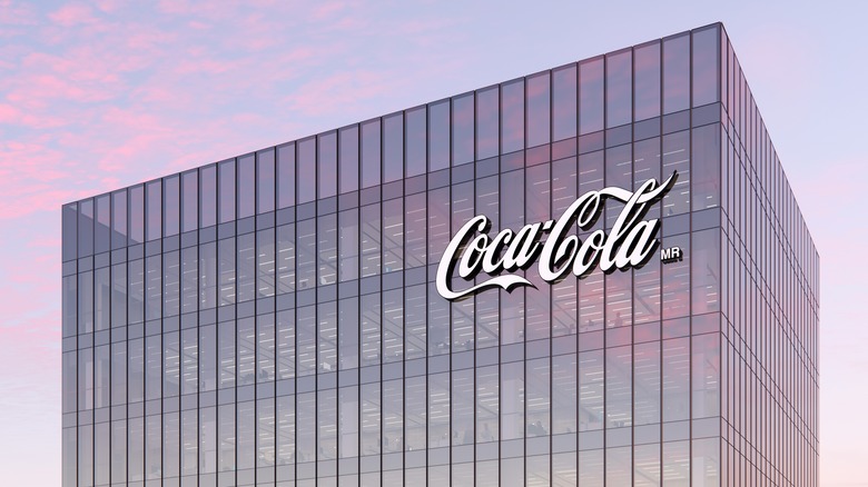 glass building with coca-cola logo