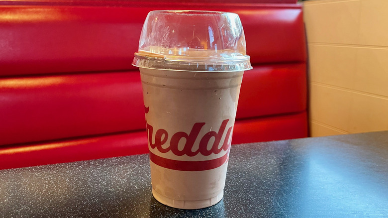 Freddy's Chocolate shake on table