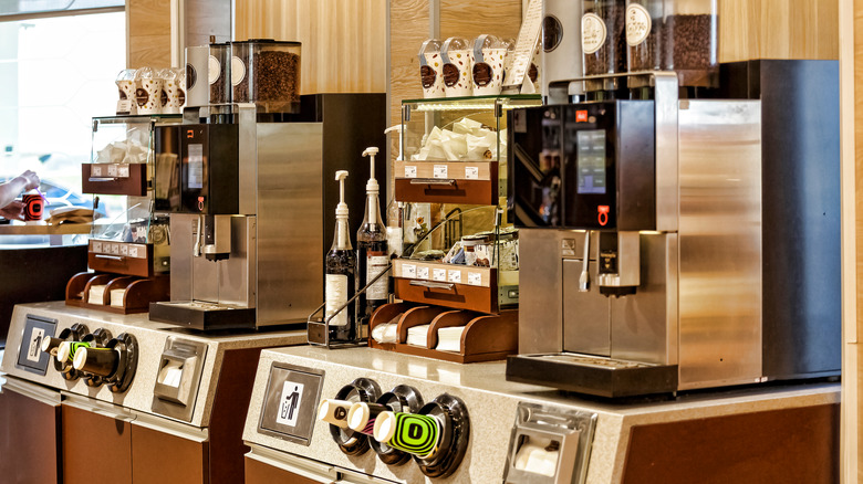 A rather elevated gas station coffee counter. 