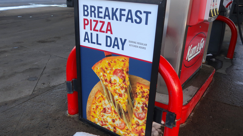 An advertisement for gas station pizza. 