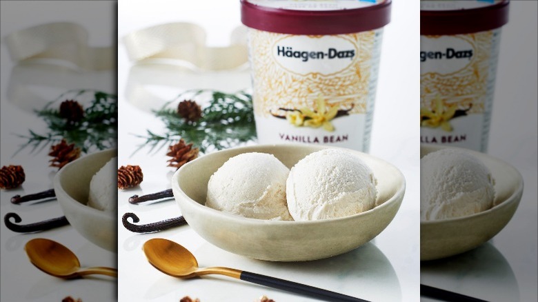 Two Scoops of Haagen-Dazs Vanilla Bean Ice Cream in Bowl with Carton Behind