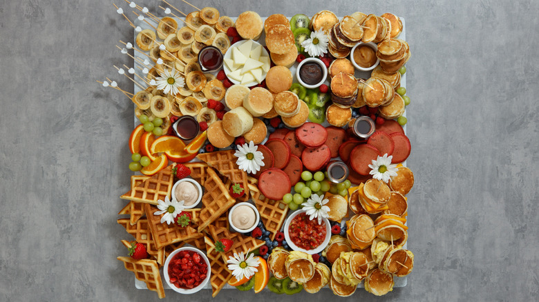 pancake and waffle party board fruit flowers