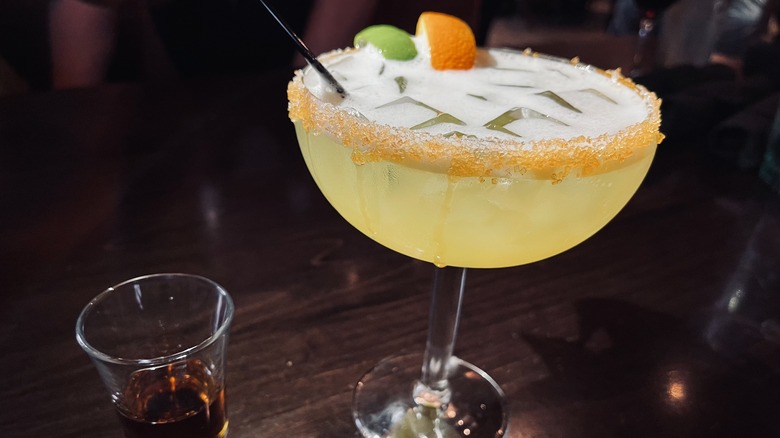 olive garden cocktail margarita with orange sugar rim shot