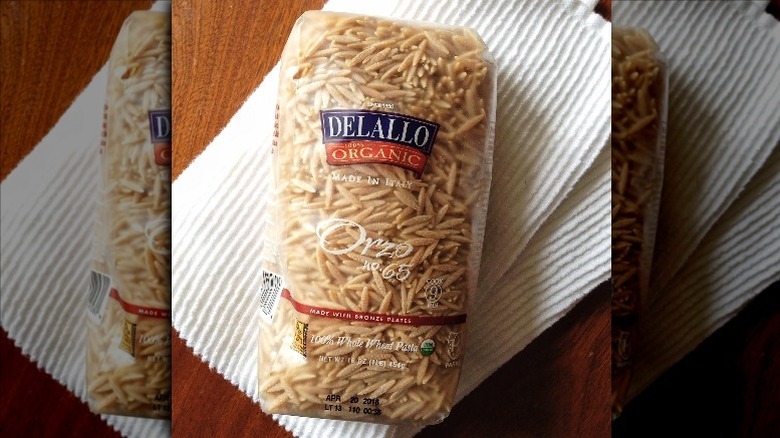 DeLallo organic orzoz pasta in a bag white napkin