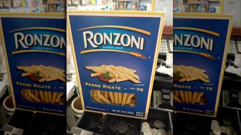 Ronzoni penne pasta box on cash reigster