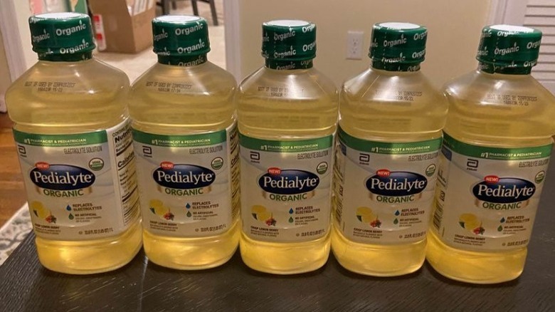 Bottles of Crisp Lemon Berry Pedialyte Organic on counter