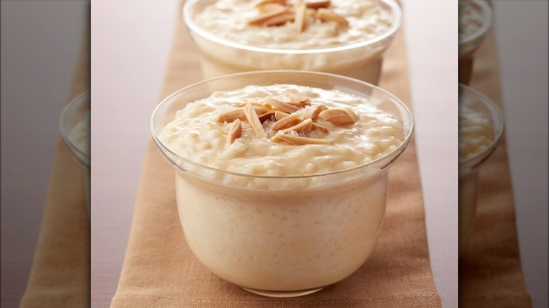 rice pudding cups topped with nuts