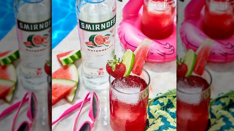 Smirnoff watermelon bottle by the pool 