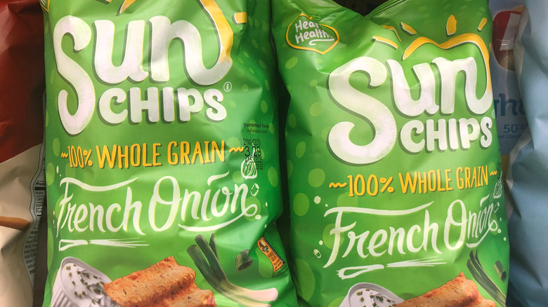 Bags of french onion sunchips of a grocery shelf