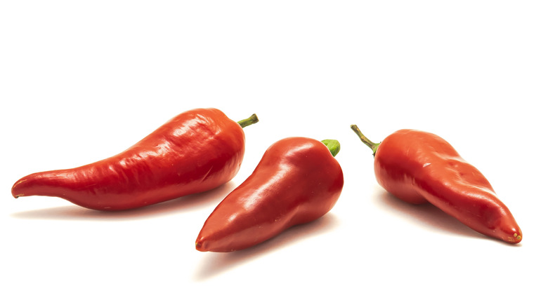 three fresno chile peppers