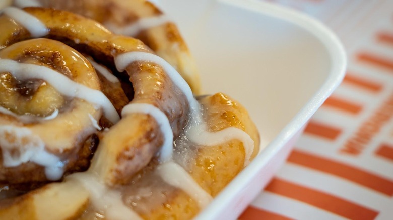 Whataburger Cinnamon Roll in Styrofoam container